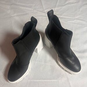 Sorel Black Heeled Boots with White Soles